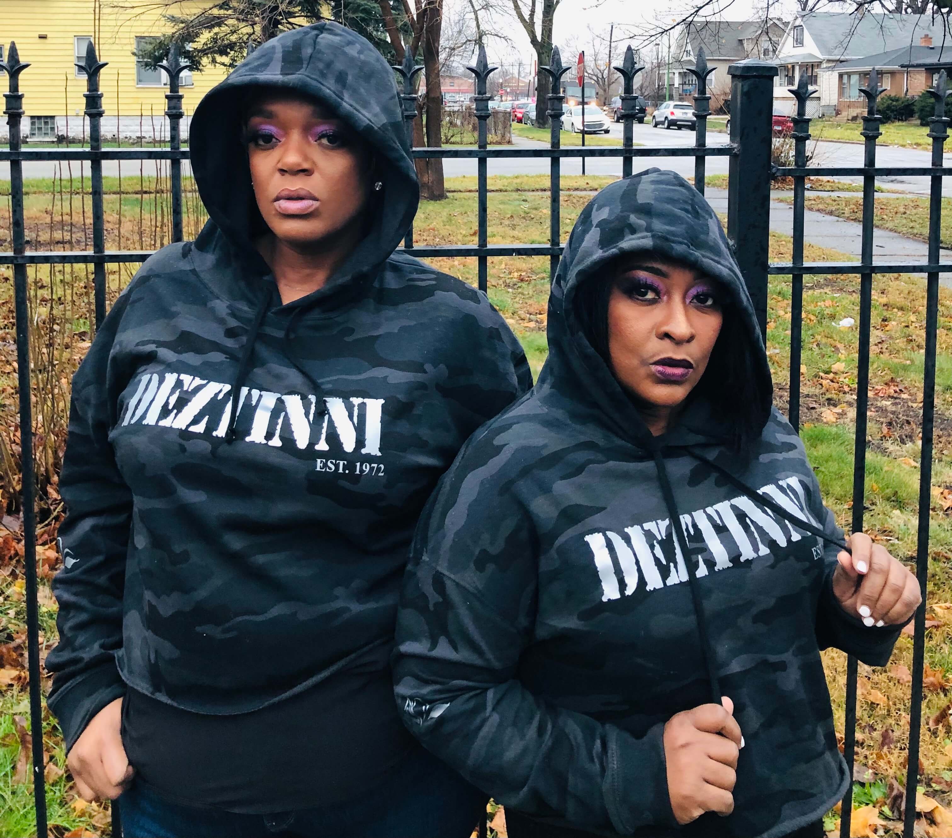picture of two women wearing hoodies